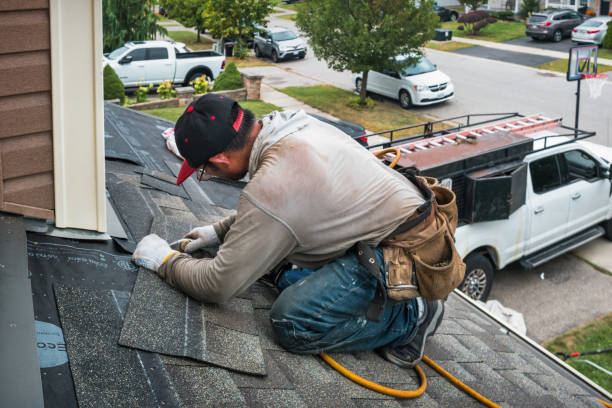 Professional Roofing technician working in Bastian, VA